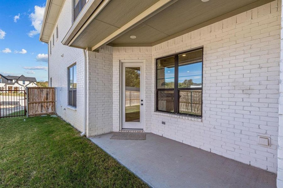Front exterior of a new home in , Aledo, TX, highlighting curb appeal (Image 1).