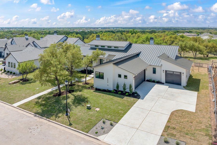 Front exterior of a new home in , Georgetown, TX, highlighting curb appeal (Image 26).