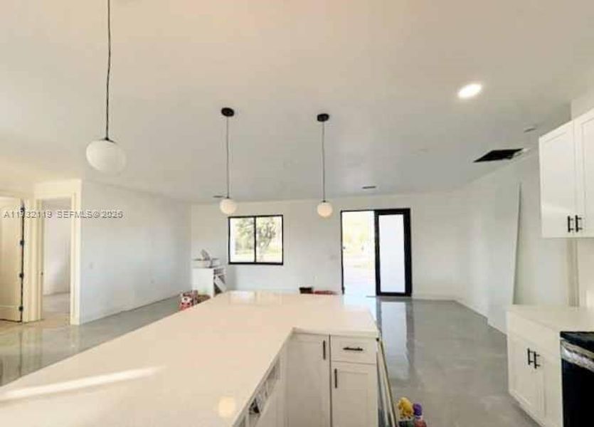 Furnished interior view inside a new home in , Clewiston (Image 14).