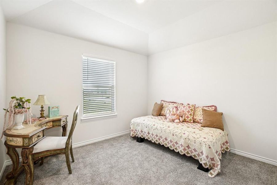 Bedroom with baseboards and carpet flooring Bedroom with baseboards and carpet flooring