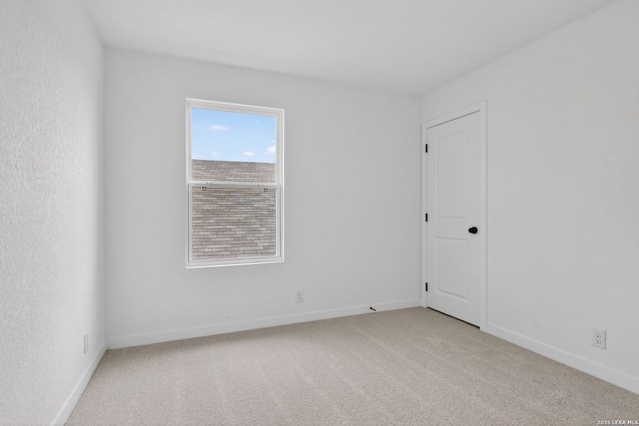 Spacious, unfurnished interior of a new home in The Wilder, Adkins (Image 24).