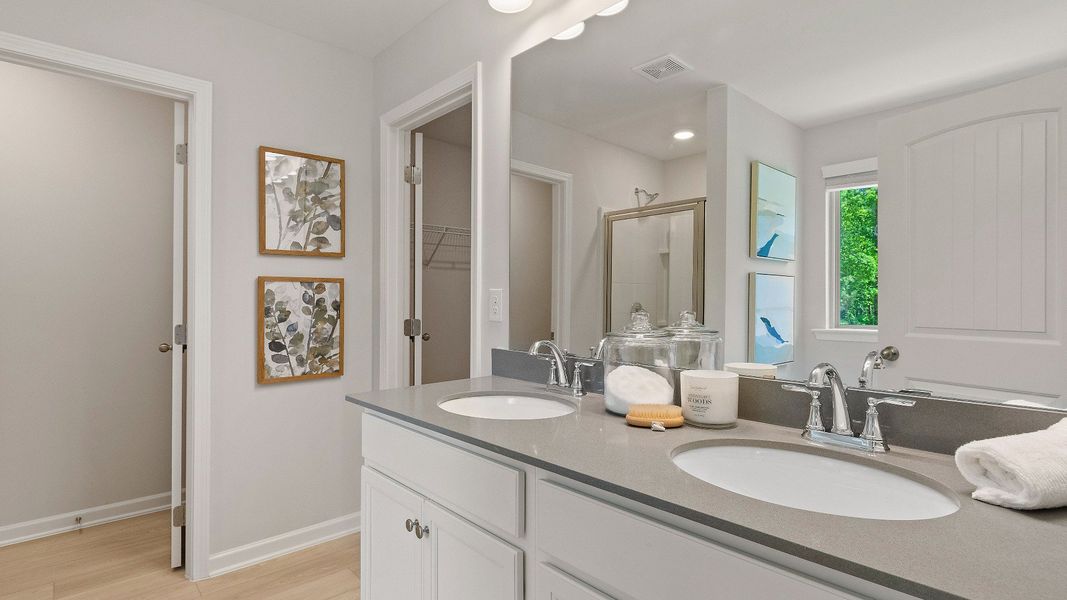 Representative furnished interior of a home built from the Reagan by DRB Homes in Towne Center, Hampton (Image 12).