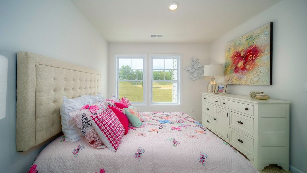 Furnished interior view inside a new home in Townes at Tap Root Farms, Fletcher (Image 32). Furnished interior view inside a new home in Townes at Tap Root Farms, Fletcher (Image 32).