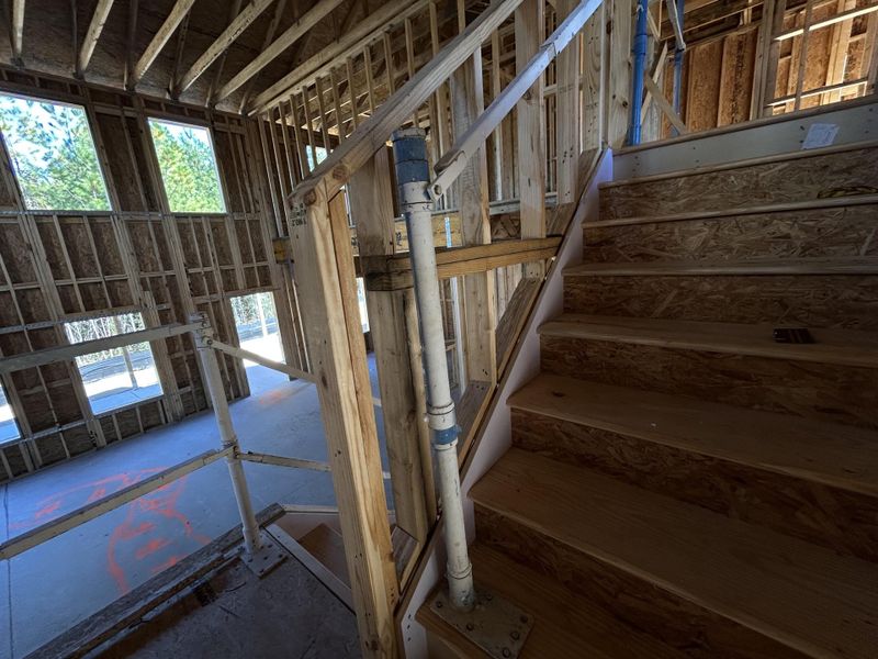 In-progress construction of a new home in Tea Farm: Presidents Series, Ravenel, SC (Image 56).