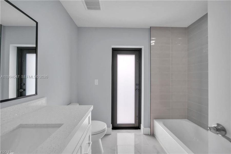 Furnished interior view inside a new home in , Lehigh Acres (Image 27).