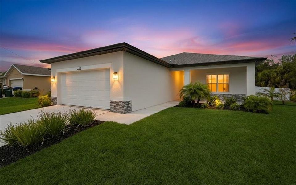 Exterior details and patio area of a home in , North Port (Image 42).