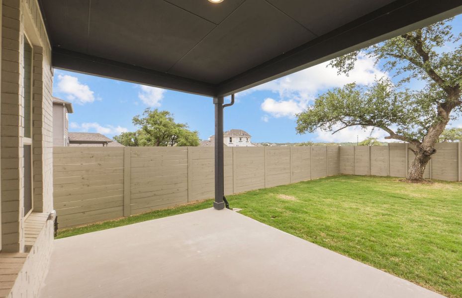 Exterior details and patio area of a home in Wolf Ranch, Georgetown (Image 26). Exterior details and patio area of a home in Wolf Ranch, Georgetown (Image 26).