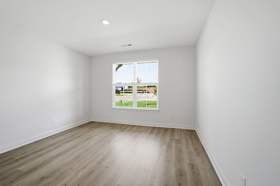 Spacious, unfurnished interior of a new home in Dorris Farm, White House (Image 24).