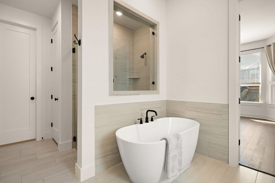 A soak the long day away in the free standing porcelain tub. A soak the long day away in the free standing porcelain tub.