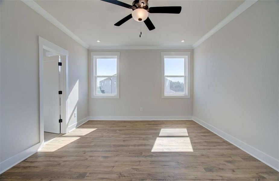 Spacious, unfurnished interior of a new home in The Paddocks at Doc Hughes, Buford (Image 48).