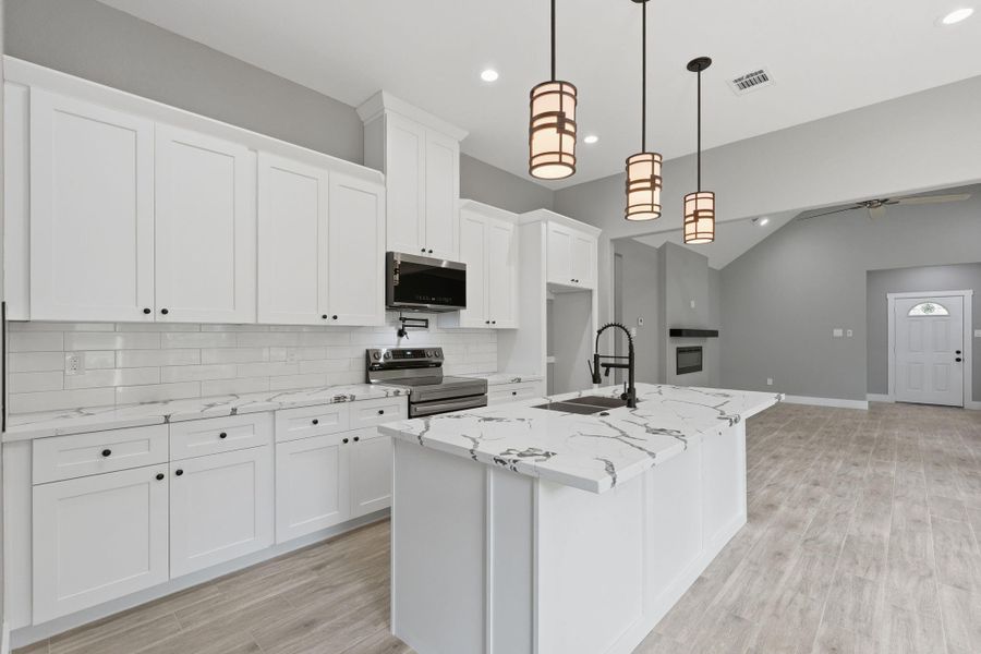 Furnished interior view inside a new home in , Willis (Image 10).