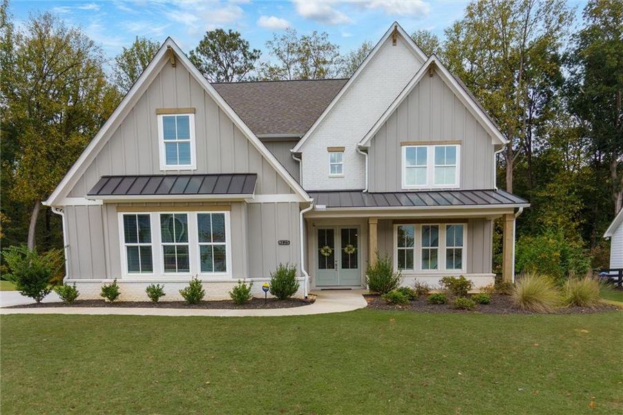 Front exterior of a new home in Fireside Farms, Gainesville, GA, highlighting curb appeal (Image 29).