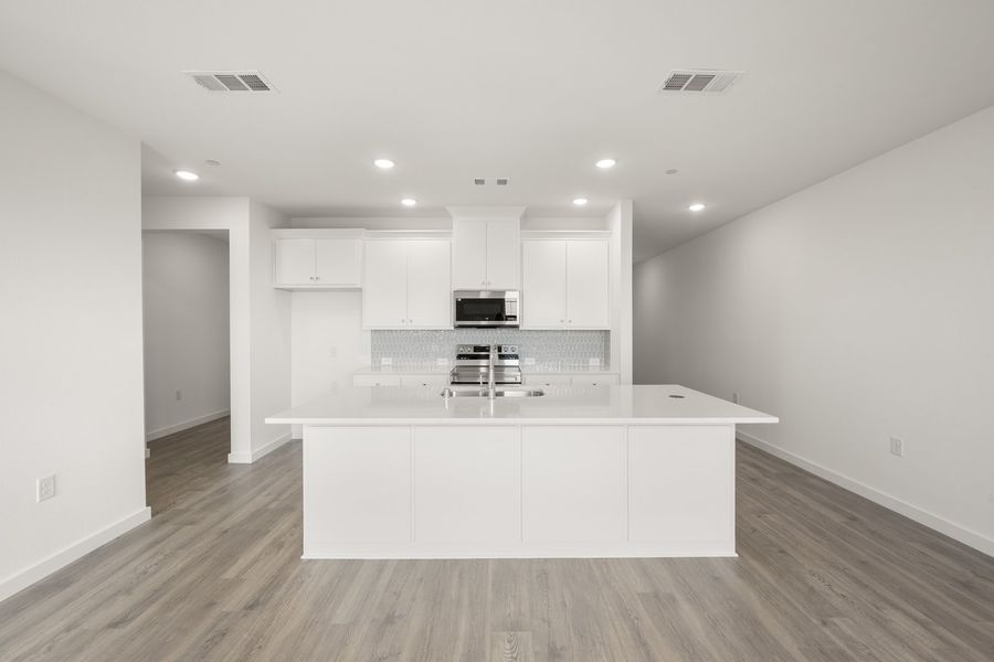 Furnished interior view inside a new home in Wildridge, Oak Point (Image 6).