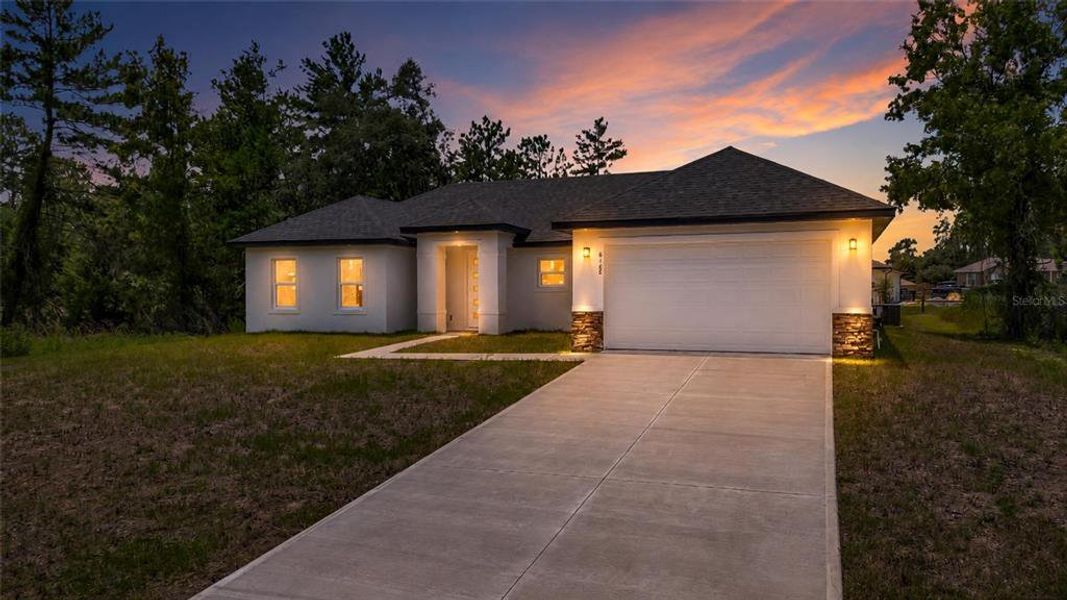 Front exterior of a new home in , Ocala, FL, highlighting curb appeal (Image 16).