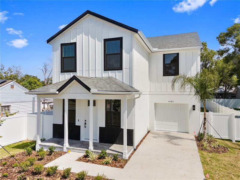 Front exterior of a new home in , St. Petersburg, FL, highlighting curb appeal (Image 28). Front exterior of a new home in , St. Petersburg, FL, highlighting curb appeal (Image 28).