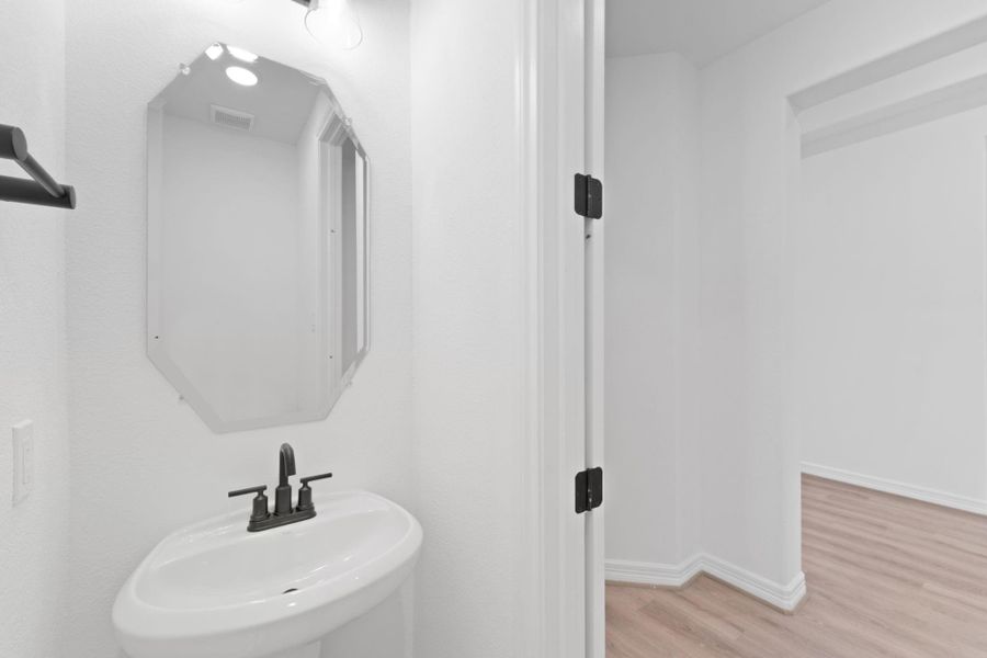 Furnished interior view inside a new home in Oakwood Estates, Waller (Image 11).
