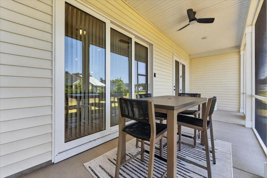 Exterior details and patio area of a home in Summerwind Crossing at Lakes of Cane Bay, Summerville (Image 4).