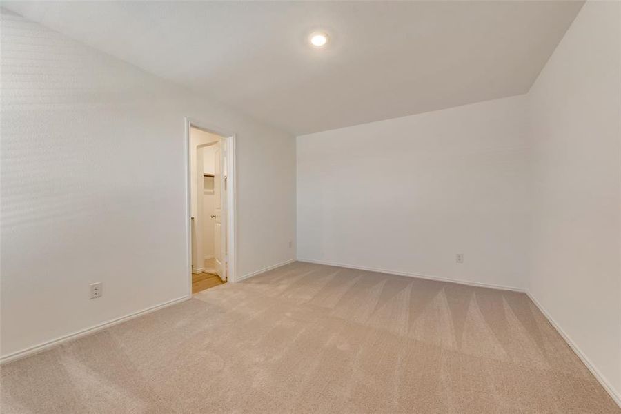 View of carpeted spare room