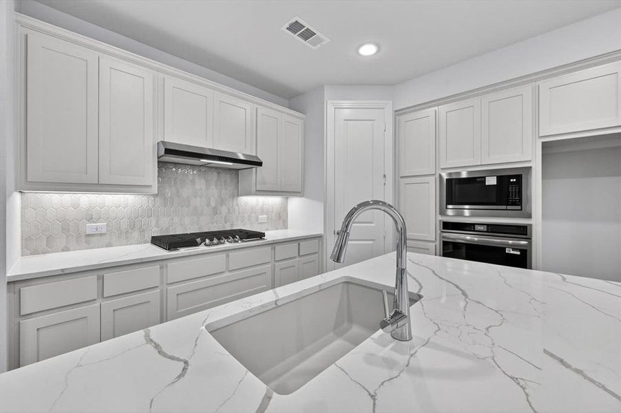 Furnished interior view inside a new home in Wellington, Haslet (Image 6).