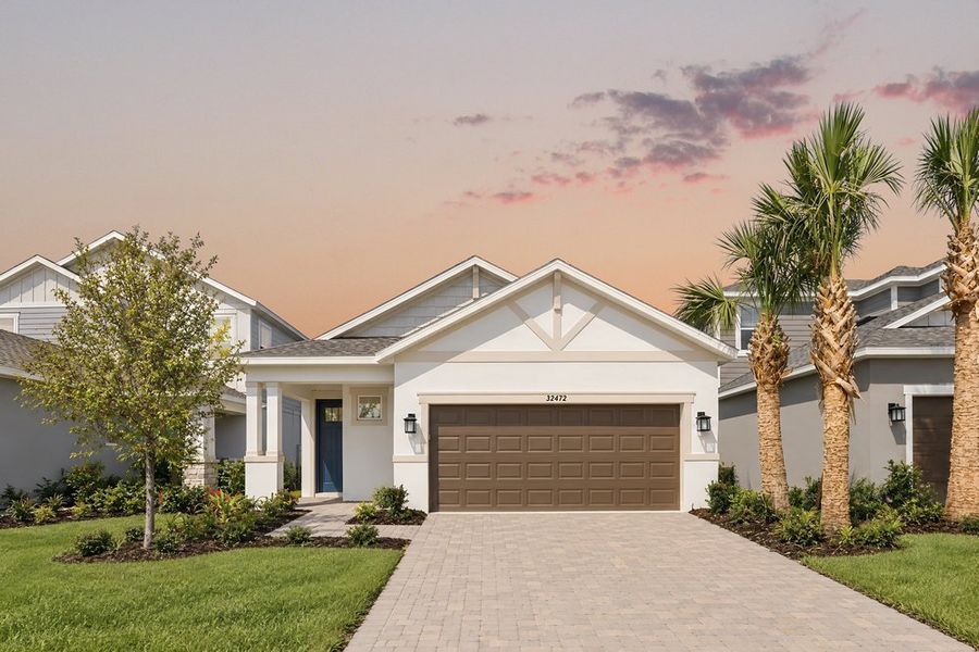 Front exterior of a new home in Lochside, Mount Dora, FL, highlighting curb appeal (Image 25). Front exterior of a new home in Lochside, Mount Dora, FL, highlighting curb appeal (Image 25).