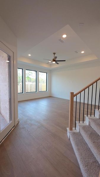 Back downstairs second family room/Den. Stairs leading to upstairs game room. Back downstairs second family room/Den. Stairs leading to upstairs game room.