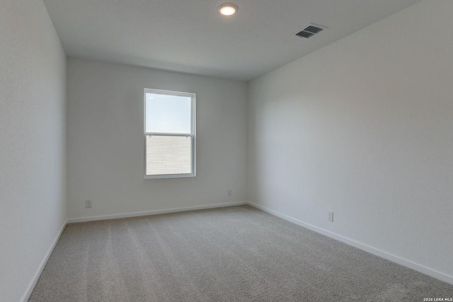 Spacious, unfurnished interior of a new home in Hennersby Hollow, San Antonio (Image 20).