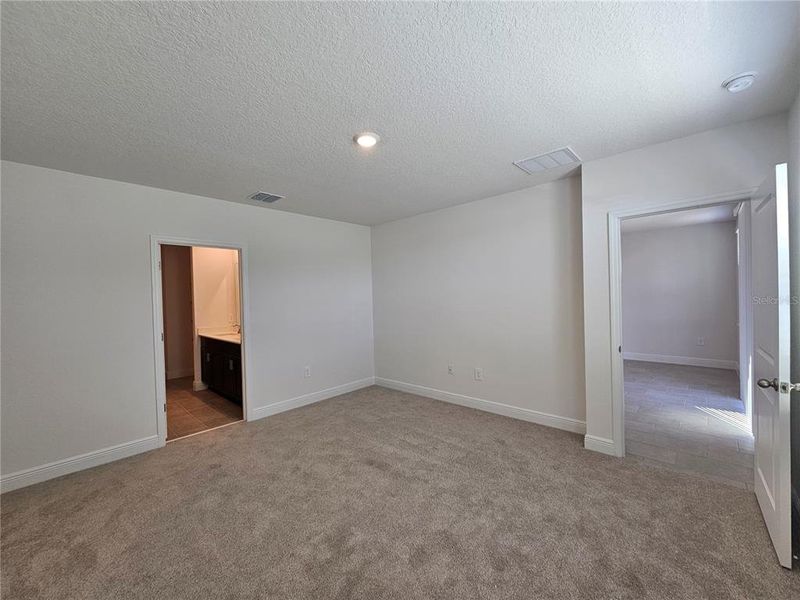 Spacious, unfurnished interior of a new home in The Reserve at Hammock Oaks - Classic Series, Lady Lake (Image 43).