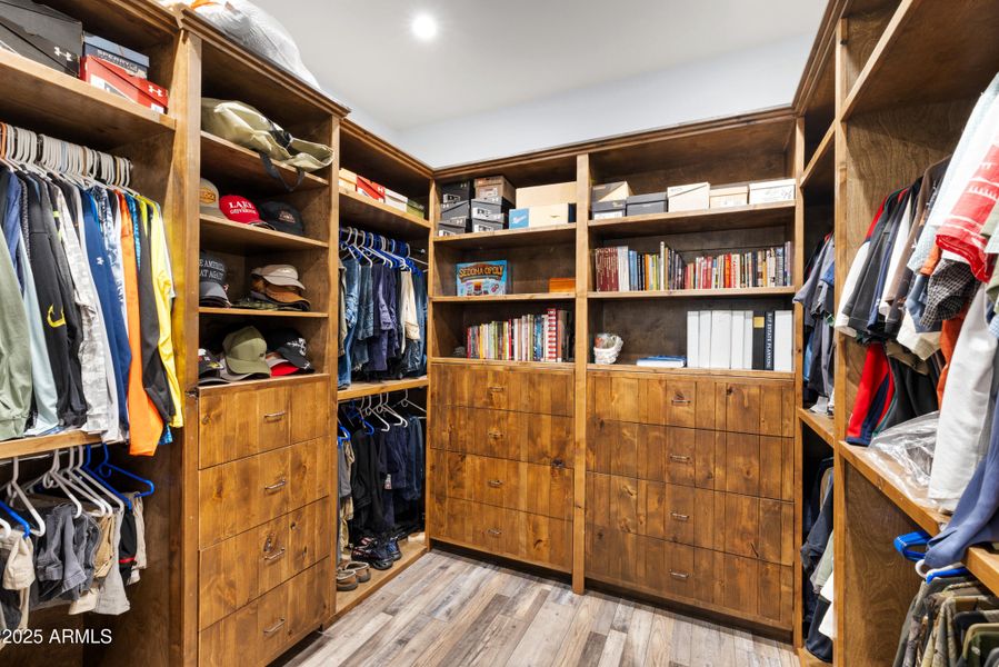 Walk in closet boasting built ins!