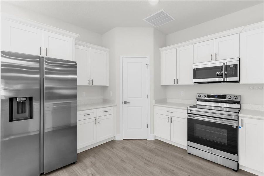 Furnished interior view inside a new home in , Ocala (Image 6). Furnished interior view inside a new home in , Ocala (Image 6).