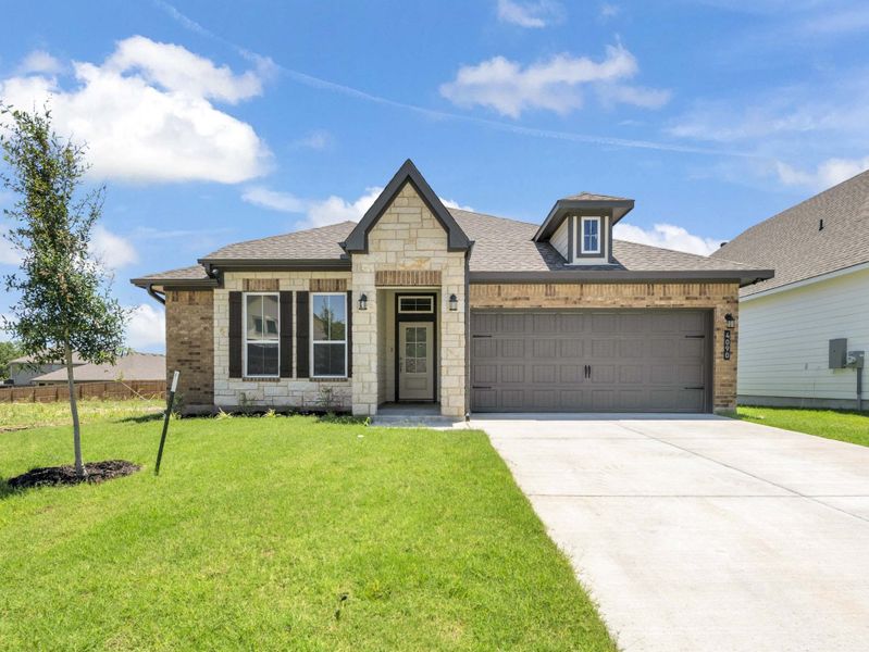 Representative exterior photo of a completed home built from the The 1613 by Stylecraft Builders in Arroyo Ranch, Seguin, TX (Image 16).