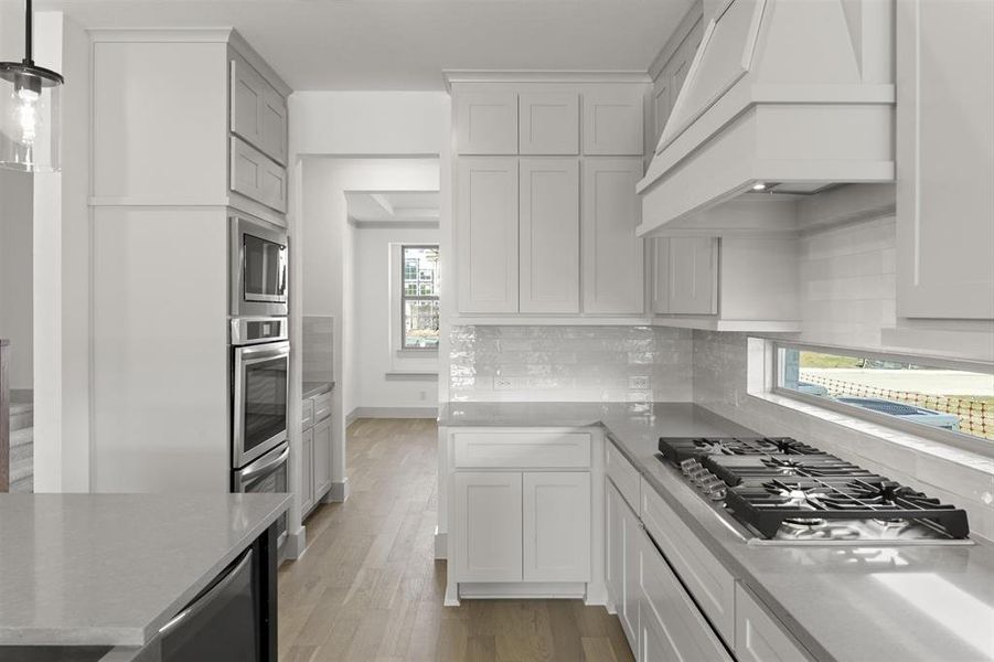 Furnished interior view inside a new home in Trails at Cottonwood Creek, Rowlett (Image 7).