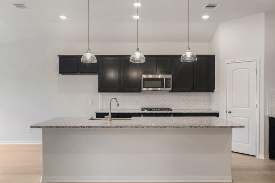 Furnished interior view inside a new home in Deer Pines, Conroe (Image 6).