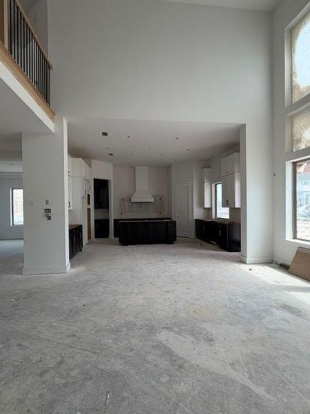 Another view of the family room from in front of the fireplace. Another view of the family room from in front of the fireplace.