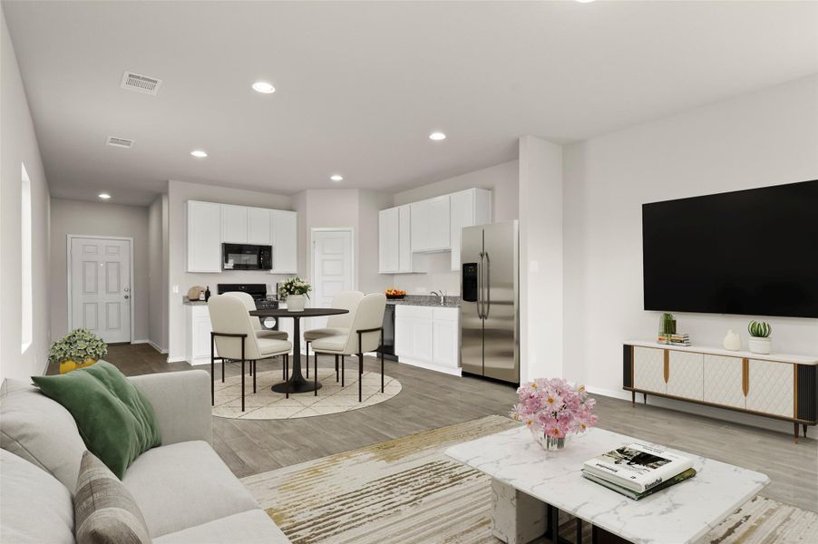 Living area featuring recessed lighting and light wood-type flooring