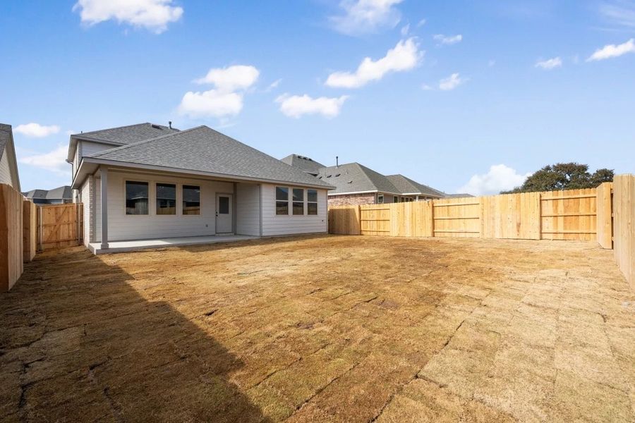 Exterior details and patio area of a home in Berry Creek Highlands, Georgetown (Image 28).