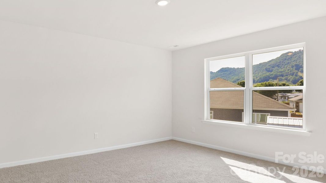Spacious, unfurnished interior of a new home in Wildbrook Village, Waynesville (Image 18).