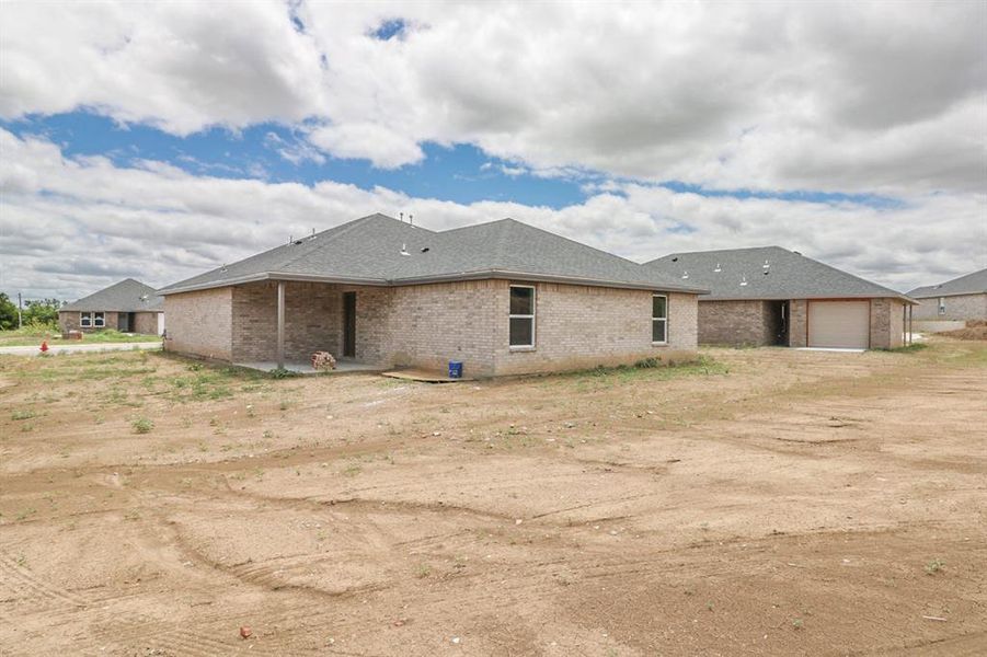 Exterior details and patio area of a home in , Coleman (Image 4). Exterior details and patio area of a home in , Coleman (Image 4).