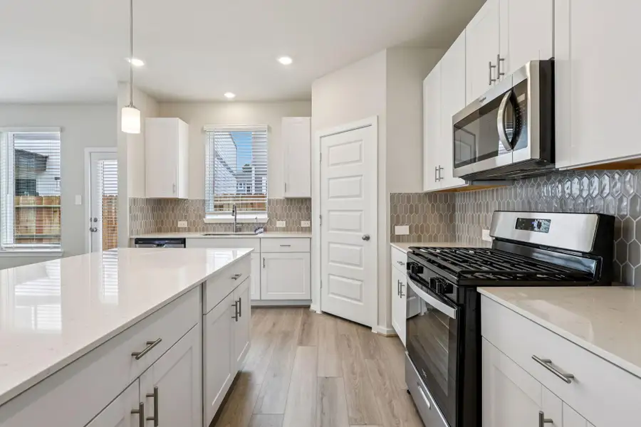 Furnished interior view inside a new home in Pinewood Trails - City Series, Atascocita (Image 11).