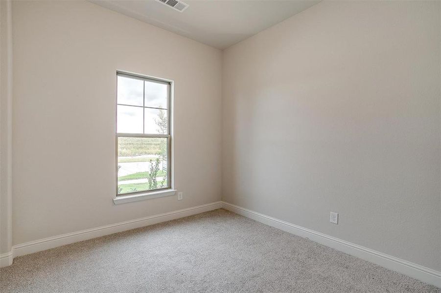 Empty room featuring carpet