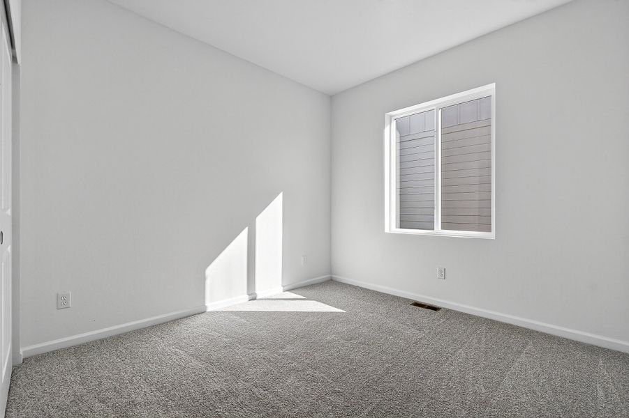 Spacious, unfurnished interior of a new home in Trailstone, Arvada (Image 24).