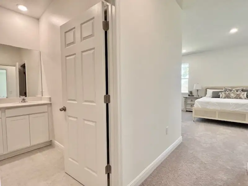 Furnished interior view inside a new home in Lakes At St Sebastian, Micco (Image 17).