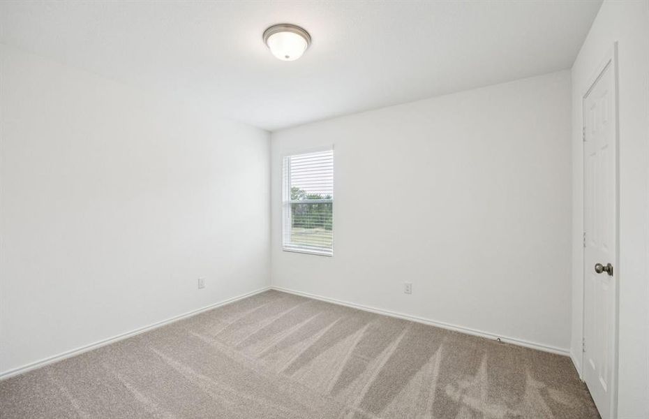 Comfortable secondary bedroom with generous closet space Comfortable secondary bedroom with generous closet space