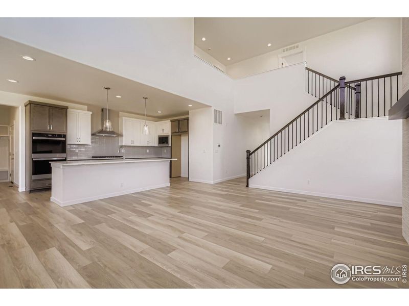 Spacious, unfurnished interior of a new home in RainDance - 60s, Windsor (Image 15).