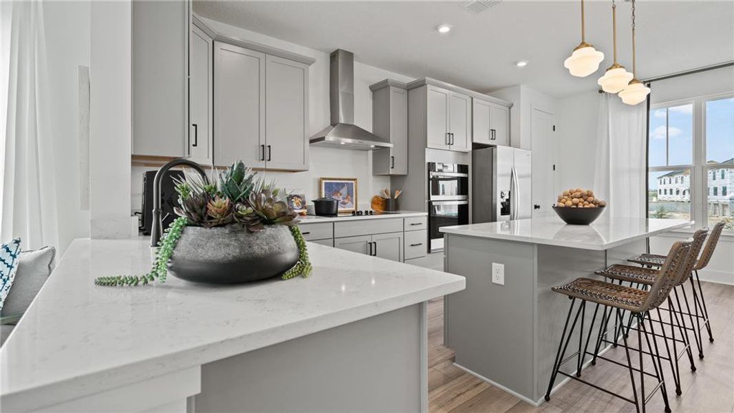 Furnished interior view inside a new home in Parkview at Hamlin, Winter Garden (Image 44).