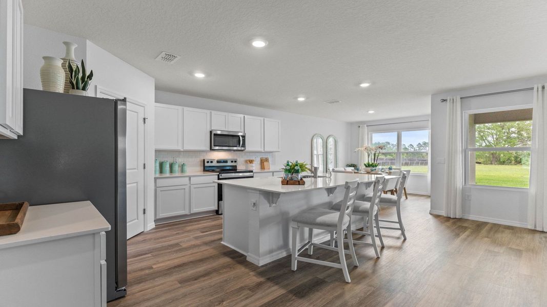 Representative furnished interior of a home built from the Madison by D.R. Horton in Wexford Cove, Ormond Beach (Image 6).