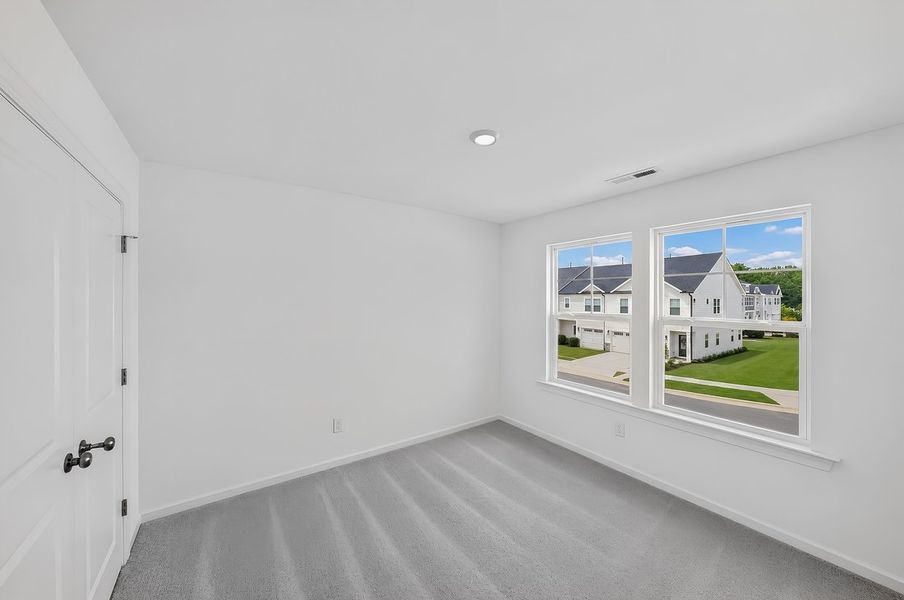 Spacious, unfurnished interior of a new home in Magnolia Townes, Wendell (Image 13).