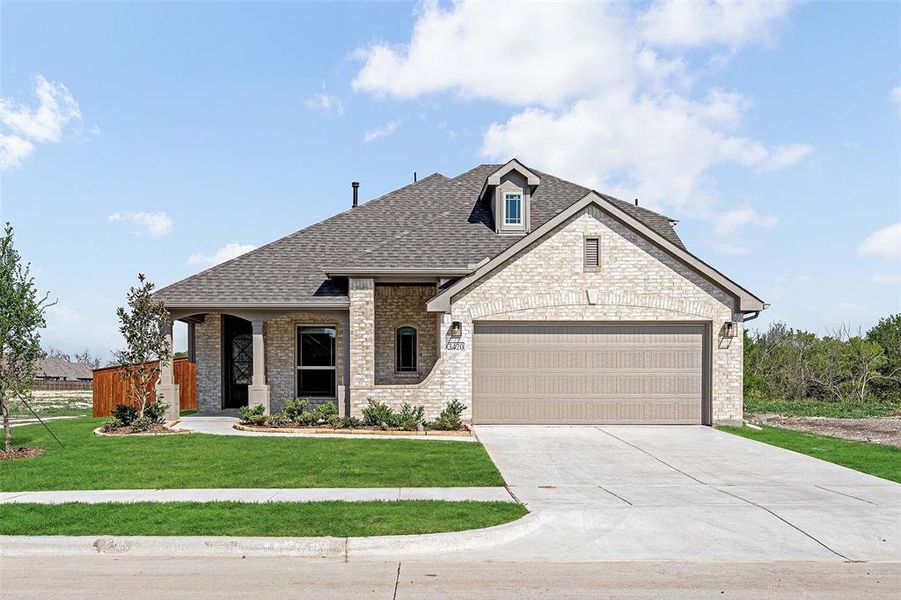 Front exterior of a new home in Liberty, Melissa, TX, highlighting curb appeal (Image 1).