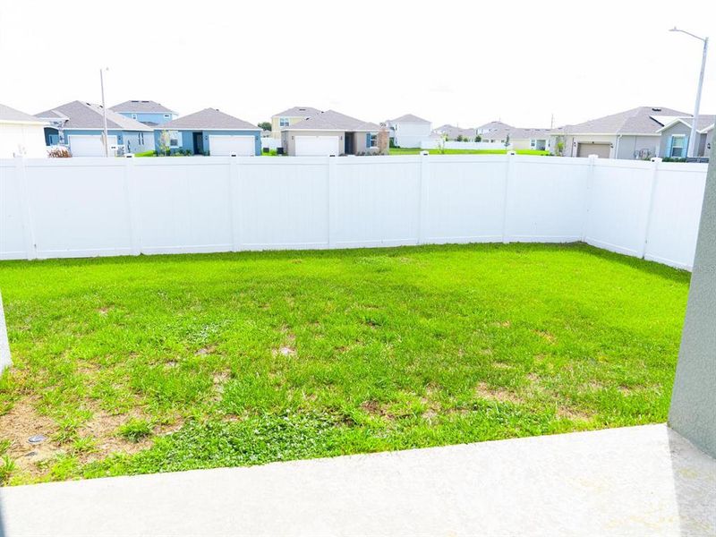 Exterior details and patio area of a home in Cypress Park Estates, Haines City (Image 19).