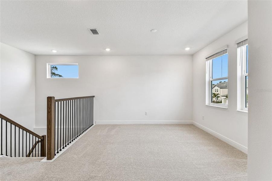 Spacious, unfurnished interior of a new home in Hawkstone, Sarasota (Image 31).
