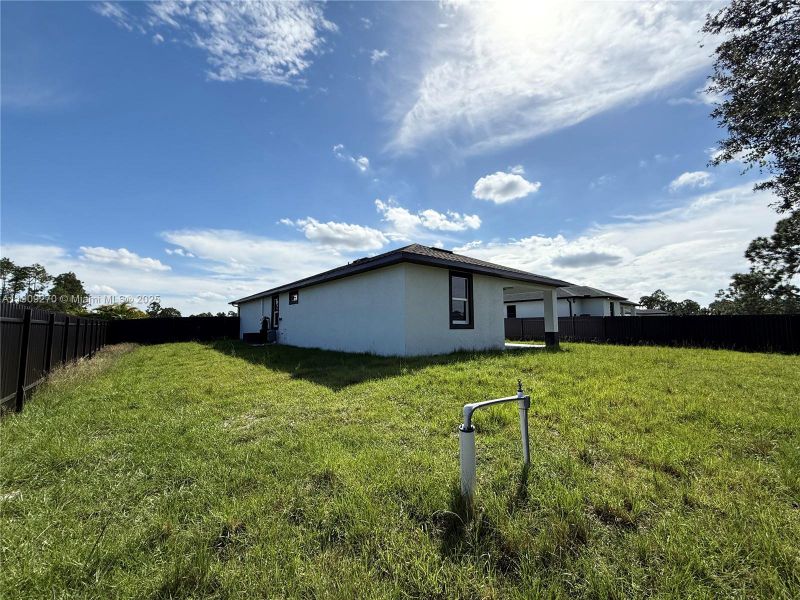Exterior details and patio area of a home in , Lehigh Acres (Image 23). Exterior details and patio area of a home in , Lehigh Acres (Image 23).